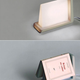 Illustration for article titled Reading Lamp Is a Book Stand, Light, and Bookmark All in One